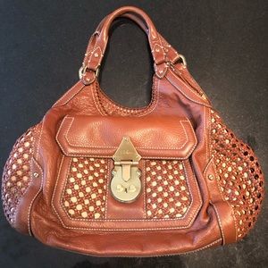 Cole Haan Cognac colored leather weaved handbag